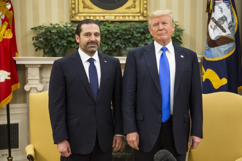 President Donald Trump holds a bi-lateral meeting with Saad Al-Hariri, Prime Minister of Lebanon, in the Oval Office at the White House in July 2017. Two flight attendants have accused Al-Hariri of sexual assault and “brutal workplace rape” on numerous occasions. File Photo by Zach Gibson/UPI