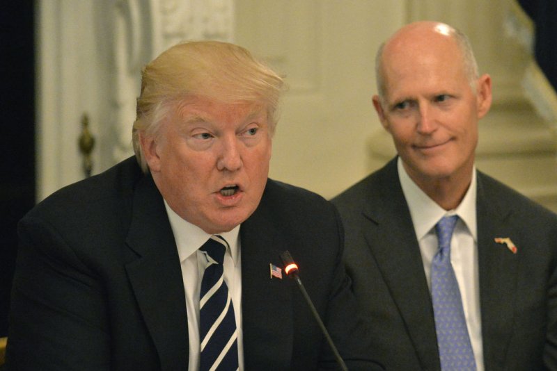 Former President Donald Trump (L, 2017) picked up an endorsement from Florida Sen. Rick Scott (R) on Thursday. File Photo by Mike Theiler/UPI