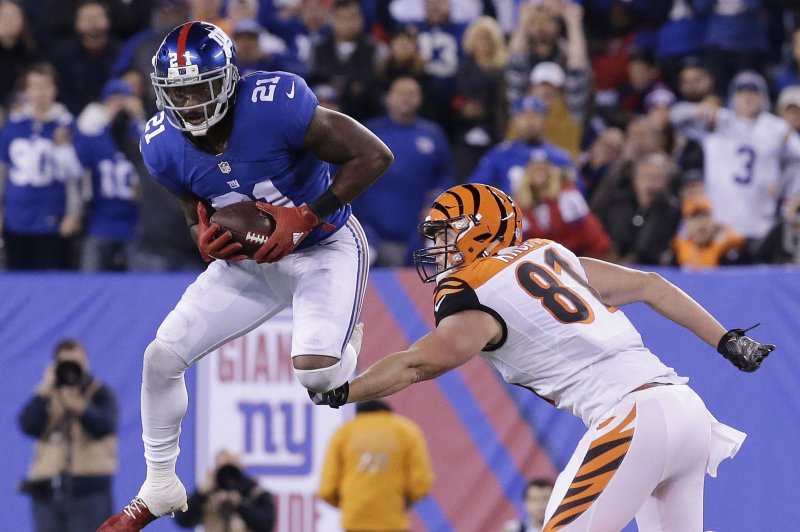 The New York Giants opted not to place the franchise tag on safety Landon Collins (L), likely sending the All-Pro into free agency. File Photo by John Angelillo/UPI