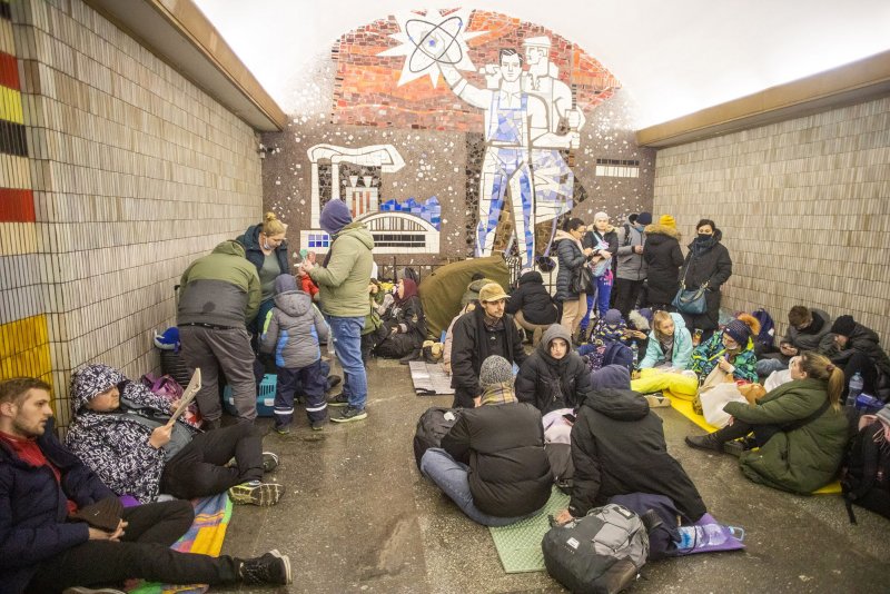 Ukrainians rest in the Kyiv subway, using it as a bomb shelter, on February 24 as Russian forces invaded the country. Photo by Oleksandr Khomenko/UPI