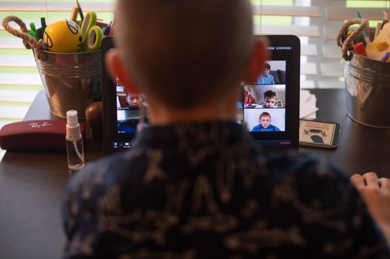 Increased screen time among children and teens during the pandemic was associated with mental health and behavioral problems, according to a new study. File Photo by Kevin Dietsch/UPI
