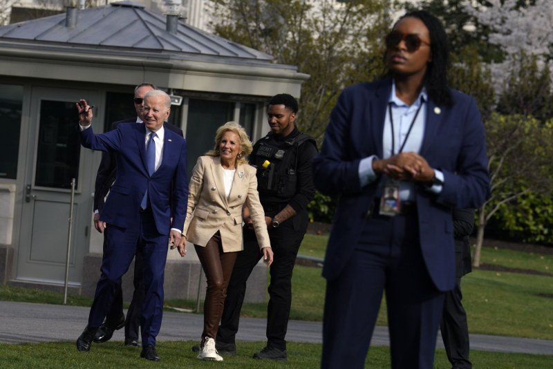 U.S. President Joe Biden and his wife, Jill, walk on the South Lawn of the White House before boarding Marine One to depart to Ottawa, Canada, on Thursday. Photo by Yuri Gripas/UPI