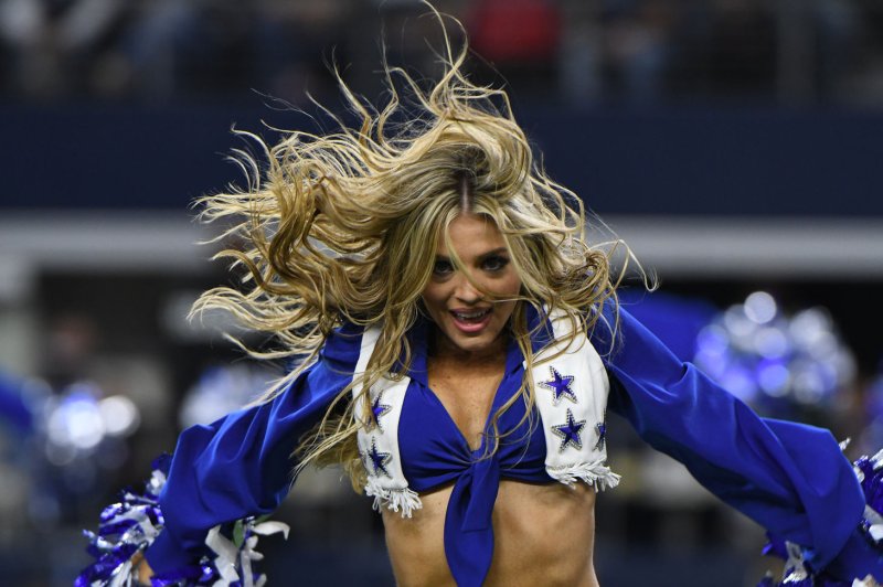 A Dallas Cowboys Cheerleader performs during a time out at the Cowboys and Philadelphia Eagles game on November 19 at AT&T Stadium in Arlington, Texas. Photo by Ian Halperin/UPI
