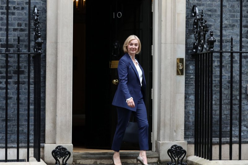 British Prime Minister Liz Truss leaves No. 10 Downing Street for her first prime minister's questions at the Houses of Parliament on Wednesday. Truss rejected a windfall profit tax on energy producers as labor leader Keir Starmer declared there's nothing new about "the Tory fantasy of trickle-down economics." Photo by Hugo Philpott/UPI