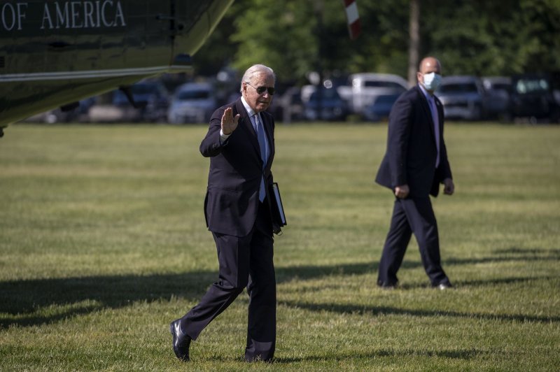 President Joe Biden is seen walking on the lawn at the White House in Washington, D.C., on Monday. He visited Michigan on Tuesday to promote his American Jobs Plan. Photo by Shawn Thew/UPI