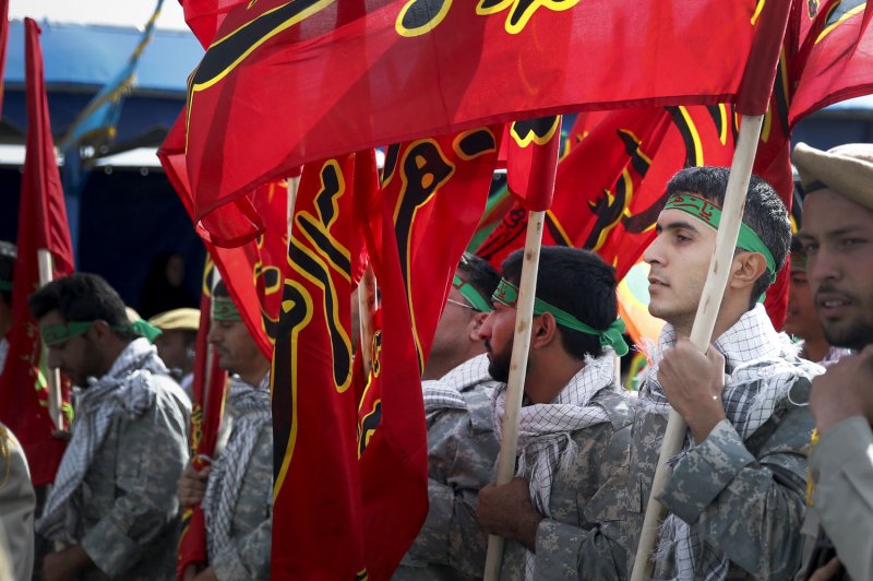 Members of the Iranian army march in a parade marking National Army Day in front of the mausoleum of the late revolutionary founder Ayatollah Khomeini in Tehran, Iran, April 18, 2014. On February 22, 2015, Iran announced the official end of a special mission defending its western borders against advancing Islamic State forces in Iraq. Photo by Maryam Rahmanian/UPI