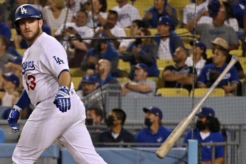 Los Angeles Dodgers second baseman Max Muncy flips his bat after hitting a solo home run off Pittsburgh Pirates' relief pitcher Chasen Shreve in the eighth inning Monday at Dodger Stadium in Los Angeles. Photo by Jim Ruymen/UPI | <a href="/News_Photos/lp/ab8b18b49396fc53557fdddc71901b9e/" target="_blank">License Photo</a>