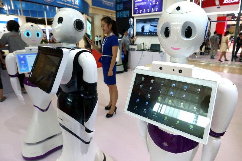 Artifical intelligence could begin replacing human workers within the next decade, a new report said Tuesday. File Photo by Stephen Shaver/UPI