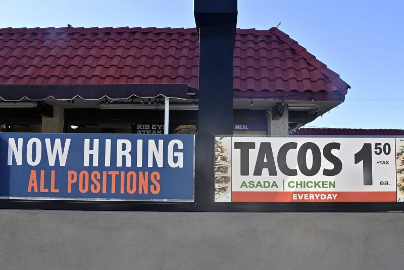 A now hiring sign is seen outside a fast-food restaurant in Wilmington, Calif., on January 27, 2021. A new report said job openings decreased in April but still remained high. File Photo by Jim Ruymen/UPI | <a href="/News_Photos/lp/caed291c24732272e3ba8d40fb7c60e2/" target="_blank">License Photo</a>