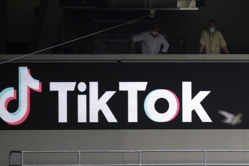 A sign for the social media app TikTok is displayed when the New York Yankees play the New York Mets at Yankee Stadium on August 28, 2020, in New York City. TikTok has come under renewed scrutiny over user data privacy. File Photo by John Angelillo/UPI