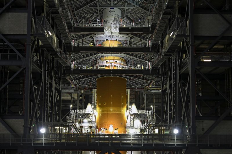 NASA's SLS rocket stands inside the Vehicle Assembly Building at Kennedy Space Center in Florida on Friday. Photo by Joe Marino/UPI | <a href="/News_Photos/lp/a55256e94c612766e375735f8e496f47/" target="_blank">License Photo</a>