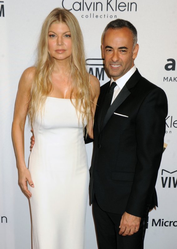 Fergie and designer Francisco Costa arrive on the red carpet at amfAR's 5th Annual Inspiration Gala at the Plaza Hotel in New York City on June 10, 2014. Calvin Klein will not host its annual Cannes party this year, reportedly due to the exit of two of its most influential creatives including Costa and Italo Succhelli. File Photo by Dennis Van Tine/UPI