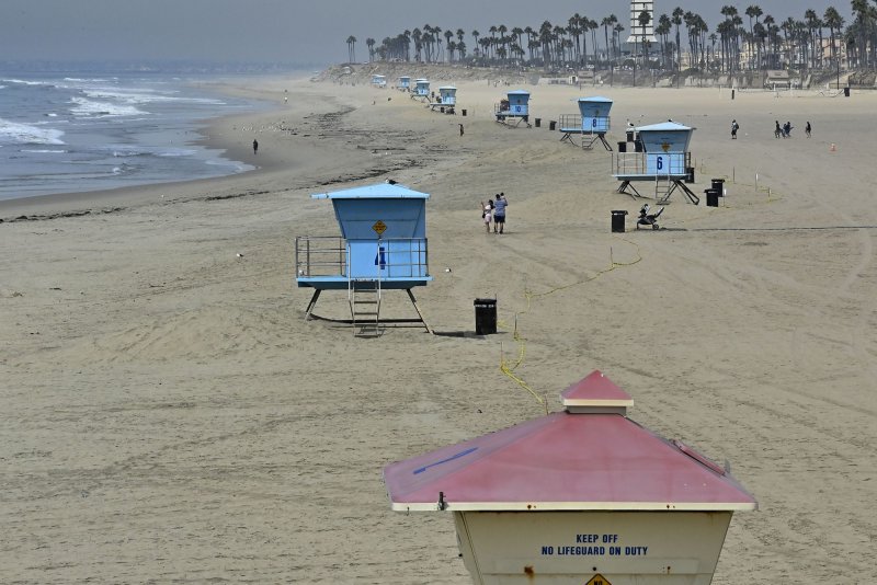 This deserted beach in Huntington Beach, Calif., was off limits to swimmers after a major oil spill dumped 126,000 gallons from an offshore oil platform in October 2021. File Photo by Jim Ruymen/UPI