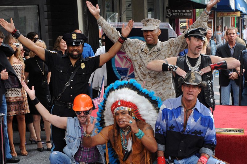 Members of the pop music group Village People (L-R back row) Ray Simpson, Alexander Briley and Eric Anzalone, (L-R front row) David Hodo, Felipe Rose and Jeff Olson ham it up during unveiling ceremonies honoring the group with the 2,369th star on the Hollywood Walk of Fame in Los Angeles on September 12, 2008. (File/UPI Photo/Jim Ruymen)