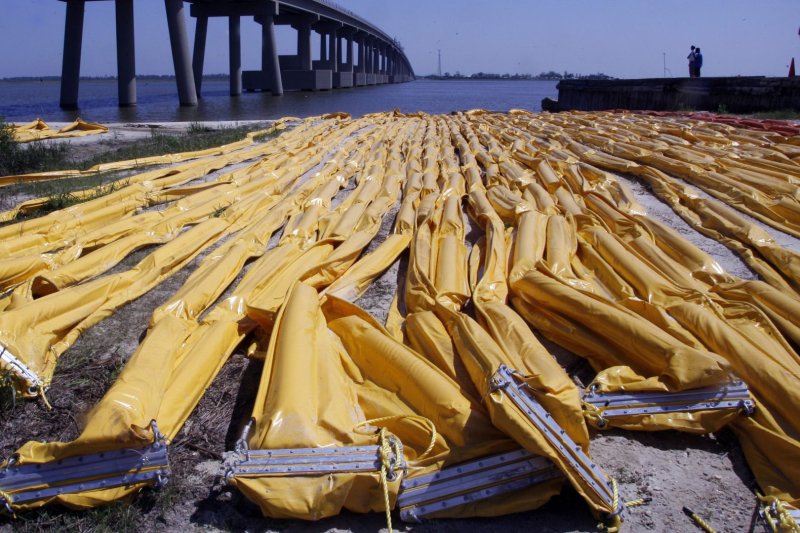 Miles of oil boom lie waiting to be deployed in New Orleans. (File/UPI/A.J. Sisco)