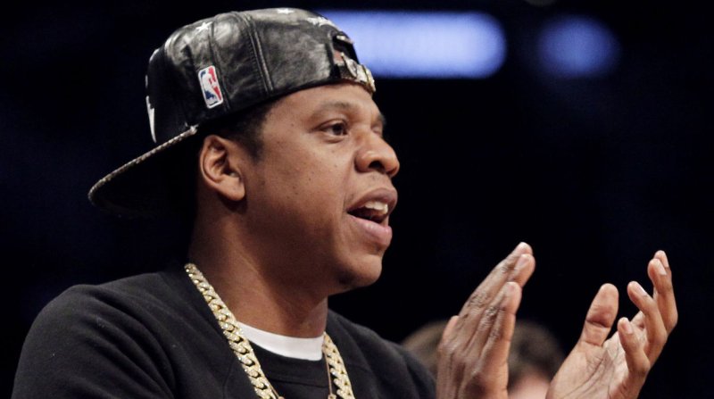 Geno Smith gets pitched by Jay-Z