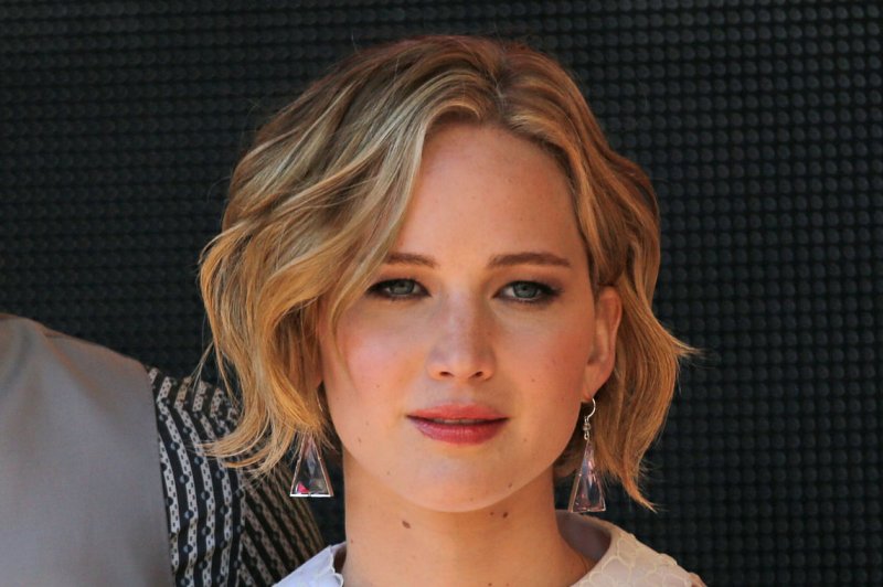 Jennifer Lawrence arrives at a photo call for the film "The Hunger Games: Mockingjay Part 1" at the Hotel Majestic in Cannes, France on May 17, 2014. UPI/David Silpa | <a href="/News_Photos/lp/a9ac6913ee110c934c91f6697bebba63/" target="_blank">License Photo</a>