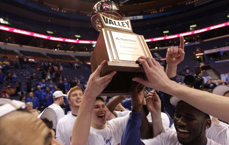 The Creighton Blue Jays celebrate their 83-79 victory over the Illinois State Redbirds in the Missouri Valley Tournament Championship game at the Scottrade Center in St. Louis on March 4, 2012. UPI/Bill Greenblatt