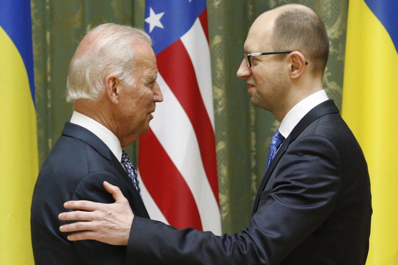 U.S. Vice President Joe Biden (L) and Ukrainian Prime Minister Arseniy Yatsenyuk shake hands after a joint news conference in Kiev, Ukraine on April 22, 2014. (UPI/Ivan Vakolenko) | <a href="/News_Photos/lp/1147c17a34097bf41965de4300bc0f9c/" target="_blank">License Photo</a>