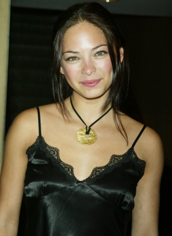NYP2003051377 - NEW YORK, May 13 (UPI) -- Kristin Kreuk of Smallville" poses for pictures at the WB Network Up-Fronts for Fall 2003 at the Sheraton Hotel on May 13, 2003. lc/Laura Cavanaugh UPI