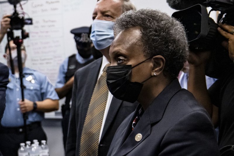 A judge on Monday ruled that police officers in Chicago are not required to get vaccinated by a Dec. 31 deadline put in place by Mayor Lori Lightfoot. File Photo by Samuel Corum/UPI/Pool
