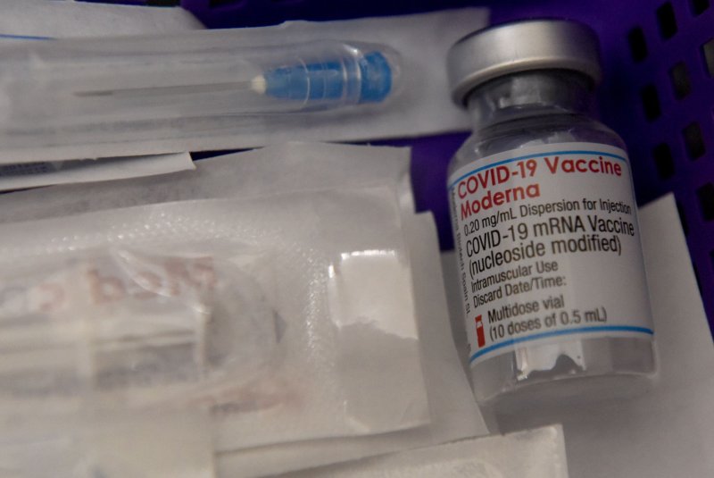 A vial of the Moderna COVID-19 vaccine is pictured in the Meuhedet Clinic in Jerusalem on January 3. Britain became the first country to approve an updated Moderna vaccine that protects users against the Omicron variant. File Photo by Debbie Hill/UPI