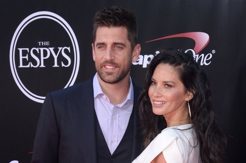 Aaron Rodgers (L) and Olivia Munn attend the ESPY Awards on July 13, 2016. The NFL star opened up about his split from Munn in a new interview. File Photo by Jim Ruymen/UPI