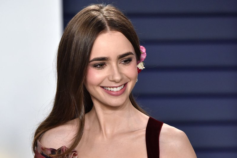 Lily Collins plays Emily Cooper on the Netflix series "Emily in Paris." File Photo by Christine Chew/UPI | <a href="/News_Photos/lp/c2bbecec6bb137cda1af20571cb82c32/" target="_blank">License Photo</a>