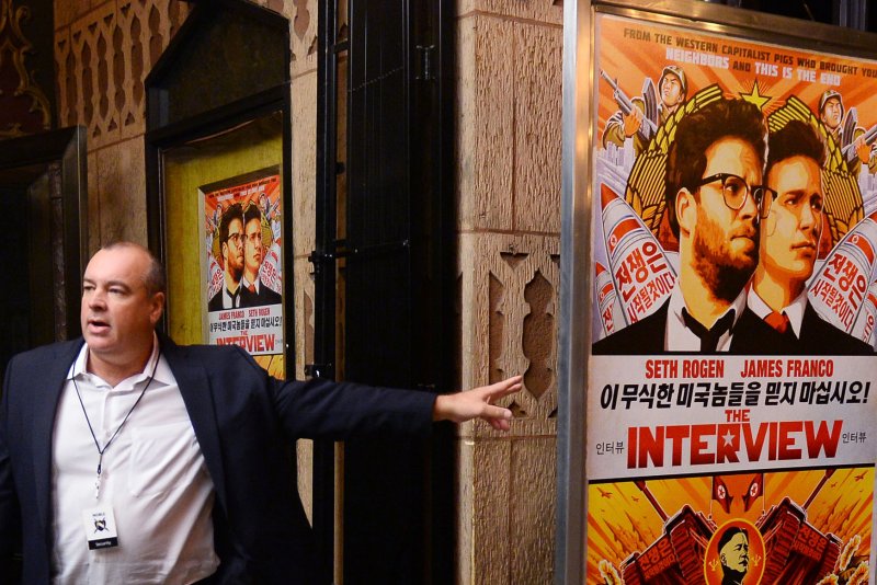 Heavy security is seen outside The Theatre at Ace Hotel before the world premiere of the motion picture comedy "The Interview" in Los Angeles on December 11, 2014. Sony studio execs cancelled Thursday's New York City premiere of the film starring Seth Rogen and James Franco, after the hackers responsible for the Sony leak threatened attacks on theaters showing the film. Hackers Guardians of Peace has threatened anyone who attends the New York premiere. The FBI, NYPD and Homeland Security are investigating. UPI/Jim Ruymen