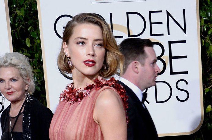 Actress Amber Heard attends the 73rd annual Golden Globe Awards at the Beverly Hilton Hotel in Beverly Hills, California, on January 10, 2016. Photo by Jim Ruymen/UPI | <a href="/News_Photos/lp/bf76691687ceb31993e08a6501672665/" target="_blank">License Photo</a>