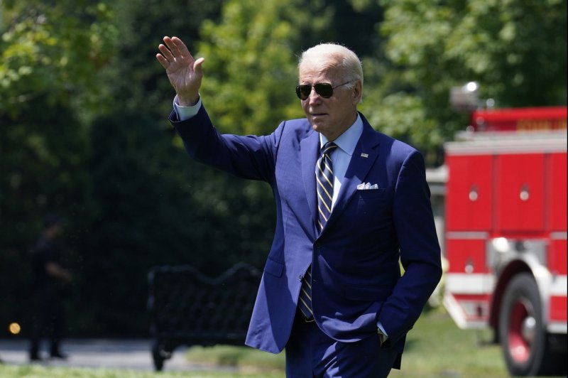 U.S. President Joe Biden waves as he departs the White House en route to Somerset, Massachusetts to deliver remarks on a clean energy future on Wednesday. Biden said "climate change is code red for humanity.". Photo by Yuri Gripas/UPI