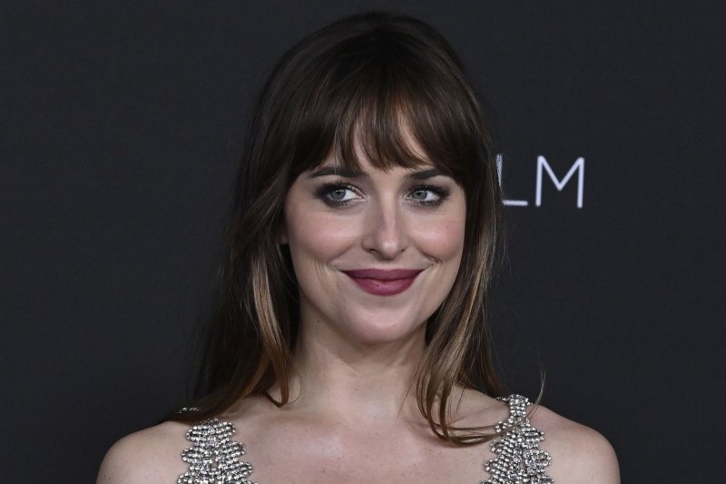 Dakota Johnson's "Persuasion" is one of the many book adaptations heading to the screen this summer. File Photo by Jim Ruymen/UPI | <a href="/News_Photos/lp/b9594bfc24b2aa48e14f708964671006/" target="_blank">License Photo</a>