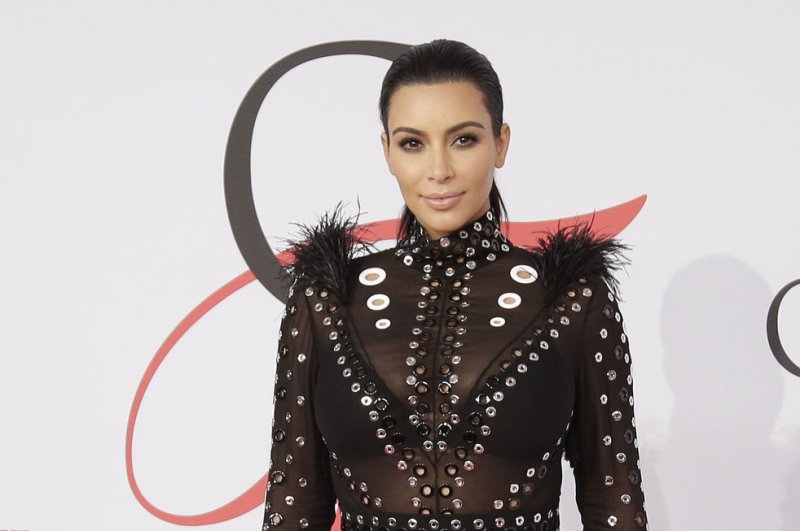 Kim Kardashian West arrives on the red carpet at he 2015 CFDA Fashion Awards at Alice Tully Hall at Lincoln Center in New York City on June 1, 2015. The television personality joined social media site Snapchat Wednesday. File Photo by John Angelillo/UPI
