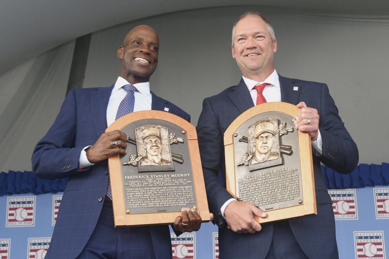 National Baseball Hall of Fame inductees Fred McGriff (L) and Scott Rolen display their plaques at their induction ceremony Sunday in Cooperstown, N.Y. Photo by George Napolitano/UPI