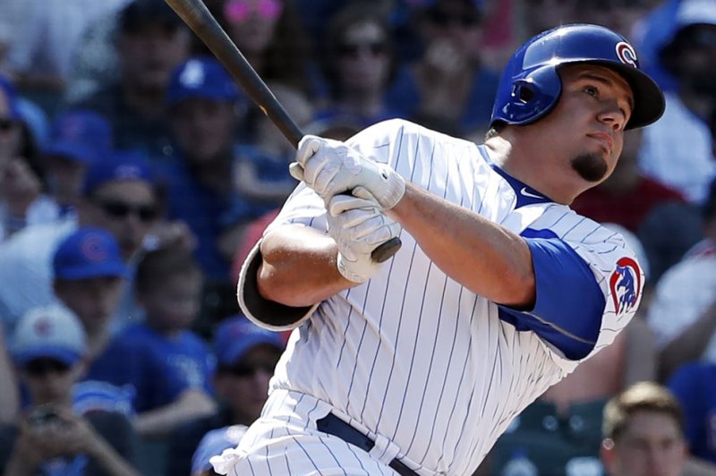 Chicago Cubs OF Kyle Schwarber hits a solo home run against the Colorado Rockies in the sixth inning on June 21 at Wrigley Field in Chicago, Ill. Photo by Kamil Krzaczynski/UPI