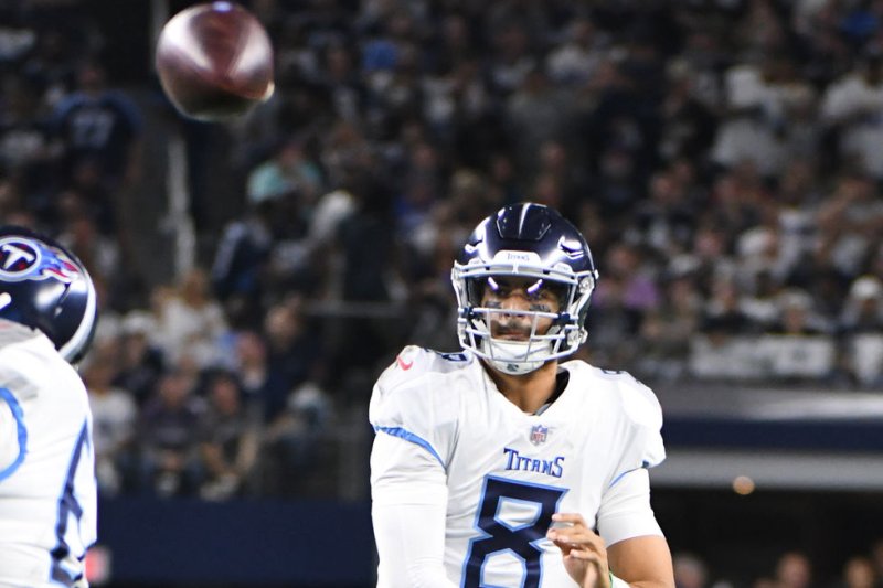 Tennessee Titans quarterback Marcus Mariota throws against the Dallas Cowboys during the first half on November 5, 2018 at AT&T Stadium in Arlington, Texas. Photo by Ian Halperin/UPI
