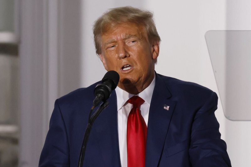 Former President Donald Trump, who skipped the GOP debate, blasted the Biden administration's EV mandate during a speech Wednesday at non-union car parts manufacturer Drake Enterprises in Michigan, calling the mandate a "government assassination of your jobs." The event comes amid the ongoing United Auto Workers strike against Ford Motor Co., Stellantis and General Motors. File photo by John Angelillo/UPI