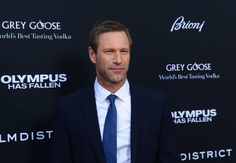 Actor Aaron Eckhart, a cast member in the motion picture thriller "Olympus Has Fallen", attends the premiere of the film at the ArcLight Cinerama Dome in the Hollywood section of Los Angeles on March 18, 2013. In a national security thriller, Antoine Fuqua directs an all-star cast featuring Gerard Butler, Morgan Freeman, Angela Bassett, Melissa Leo, Ashley Judd and Rick Yune. UPI/Jim Ruymen