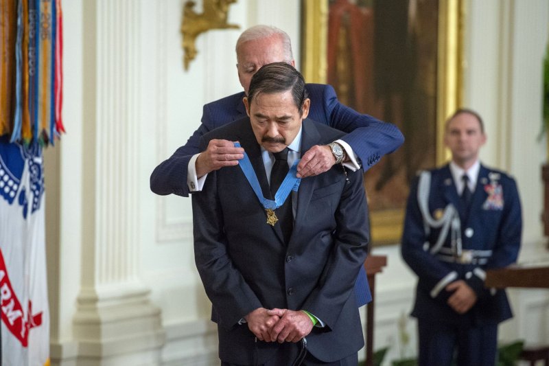 President Joe Biden awards the Medal of Honor to Army Specialist 5 Dennis Fujii during an event in the East Room of the White House in Washington, D.C. on July 5, 2022. Photo by Bonnie Cash/UPI