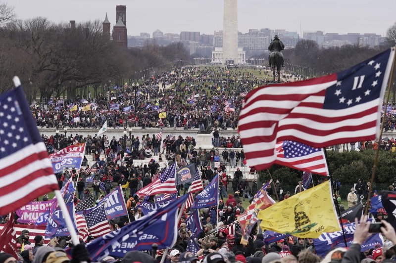 Pro-Trump rioters breach the security perimeter and penetrate the U.S. Capitol to protest against the Electoral College vote count that would certify President-elect Joe Biden as the winner in Washington, D.C., on January 6, 2021. File Photo by Ken Cedeno/UPI