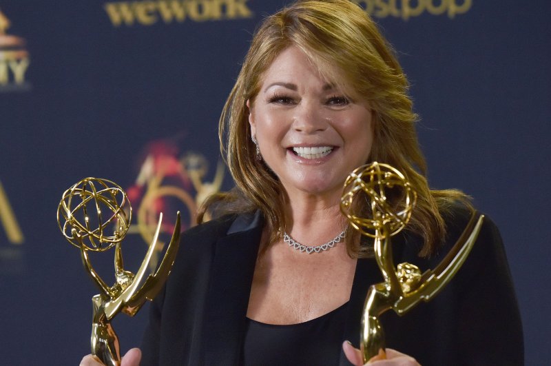"Valerie's Home Cooking" star Valerie Bertinelli holds up her Daytime Emmys for Outstanding Culinary Host and Outstanding Culinary Program backstage in the press room at the 46th Annual Daytime Emmy Awards held at the Pasadena Civic Auditorium in Pasadena, Calif. in 2019. File Photo by Chris Chew/UPI