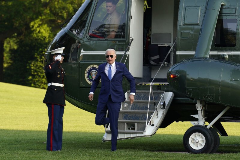 U.S. President Joe Biden arrives on the South Lawn of the White House in Washington, D.C., upon his Thursday afternoon return from Colorado, where he had given the commencement address at the U.S. Air Force Academy. At the end of that event, he had tripped over a sandbag on the stage before being helped up. Afterward when he returned to D.C., the president jokingly told White House reporters, "I got sandbagged." Photo by Yuri Gripas/UPI