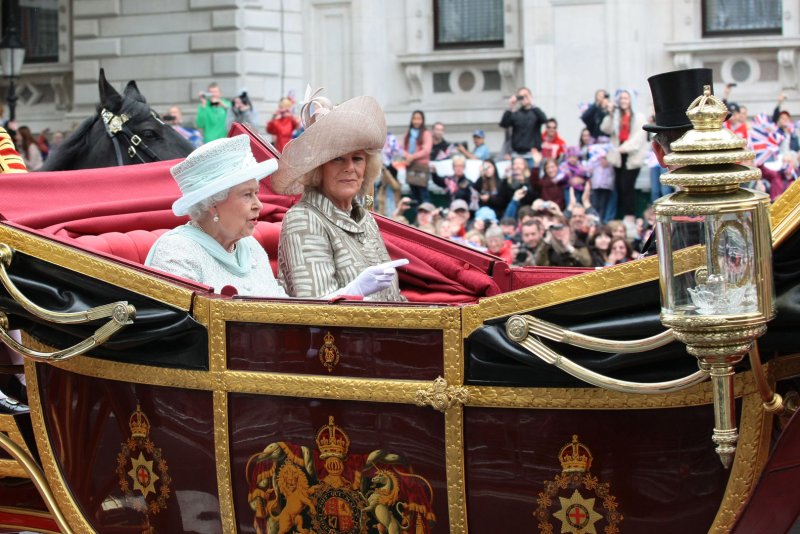 Queen Elizabeth II travels through Whitehall by carriage with Prince Charles, Prince of Wales and Camilla, Duchess of Cornwall on the way to Buckingham Palace during the Diamond Jubilee celebrations in London. File Photo by Hugo Philpott/UPI