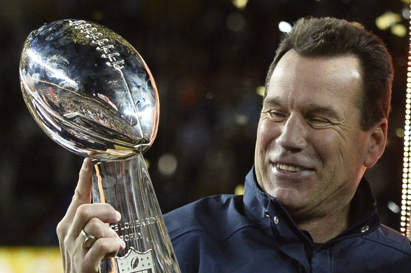 Denver Broncos Head Coach Gary Kubiak holds the Lombardi Trophy after Super Bowl 50 in Santa Clara, California on February 7, 2016. The Broncos defeated the Carolina Panthers 24-10. Photo by Brian Kersey/UPI