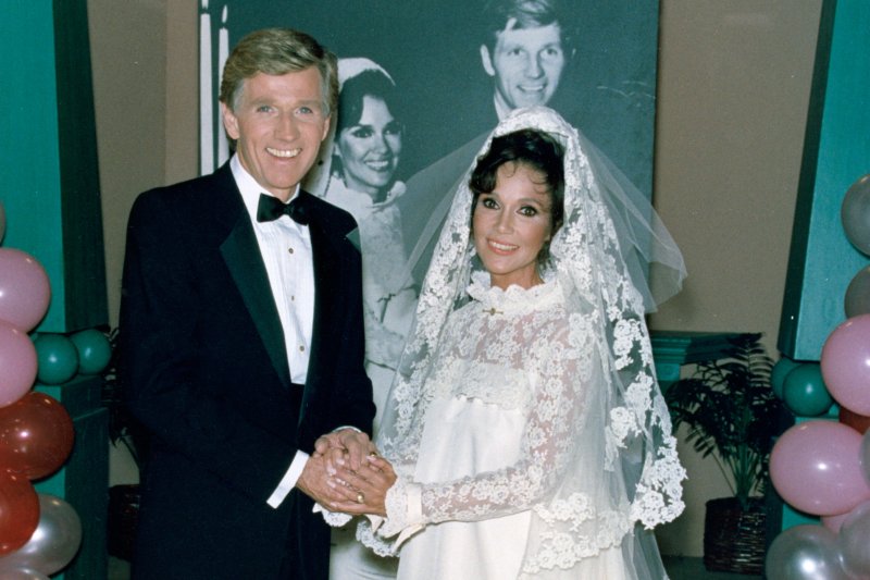 TV Show "Hour Magazine" host Gary Collins and former Miss America Mary Ann Mobley pose on Feb. 10, 1988, in the same clothing they were married in 20 years prior. Mobley died Tuesday of breast cancer. File photo by Glenn Waggner/UPI.