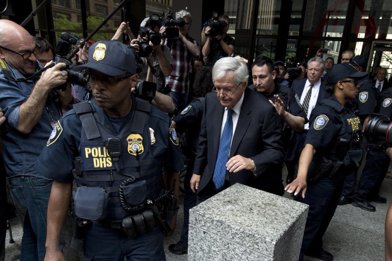 Former Speaker of the House Dennis Hastert leaves Federal Court after his arraignment on charges that he evaded banking regulations and lied about it to the FBI, on June 9, 2015 in Chicago. Hastert pleaded not guilty to allegedly evading banking regulations while making cash withdrawals to pay hush money to coverup his past wrongdoing to an unnamed individual. Hastert who was a teacher and wrestling coach at Yorkville High School in Illinois between 1965 and 1981, had allegedly agreed to pay the individual $3.5 million to cover up "past misconduct". Photo by Brian Kersey/UPI | <a href="/News_Photos/lp/73ab1bc8db8bef35a4985e12b2e0b0fa/" target="_blank">License Photo</a>