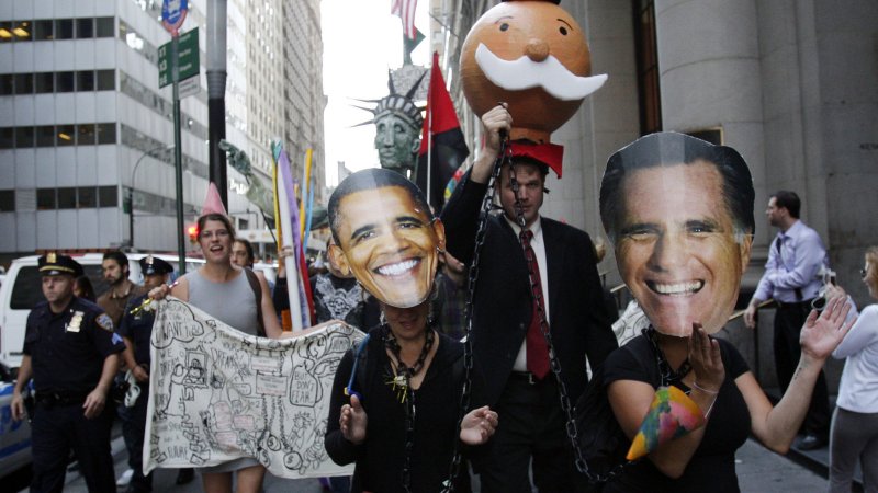 Occupy Wall Street protesters dressed like Mitt Romney and Barack Obama march on the streets In New York City on September 17, 2012. Multiple protests are planned throughout the day on the 1st Anniversary of the Occupy Wall Street Movement. UPI/John Angelillo