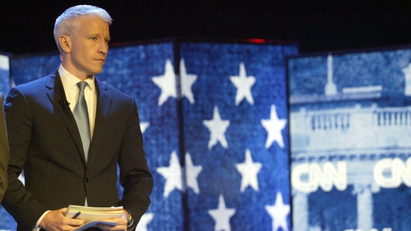 CNN announcer Anderson Cooper walks onstage as he prepares to moderate the Democratic presidential debate at the Citadel in Charleston, South Carolina on July 23, 2007. (UPI Photo/Nell Redmond) | <a href="/News_Photos/lp/bf3d2cd1500d7af33beb5e21f4af1f1f/" target="_blank">License Photo</a>