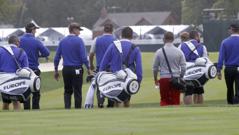 European teammates Justin Rose, Ian Poulter, Peter Hanson and Martin Keymer walk down the first fairway with their caddies during the second day of practice rounds at Medinah Country Club, site of the 39th Ryder Cup matches September 26, 2012 in Medinah, Illinois. UPI/Frank Polich