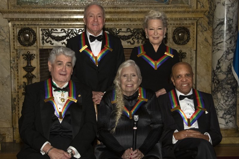 The recipients of the 44th Annual Kennedy Center Honors pose for a group photo following the Medallion Ceremony at the Library of Congress in on Saturday. Photo by Ron Sachs/UPI